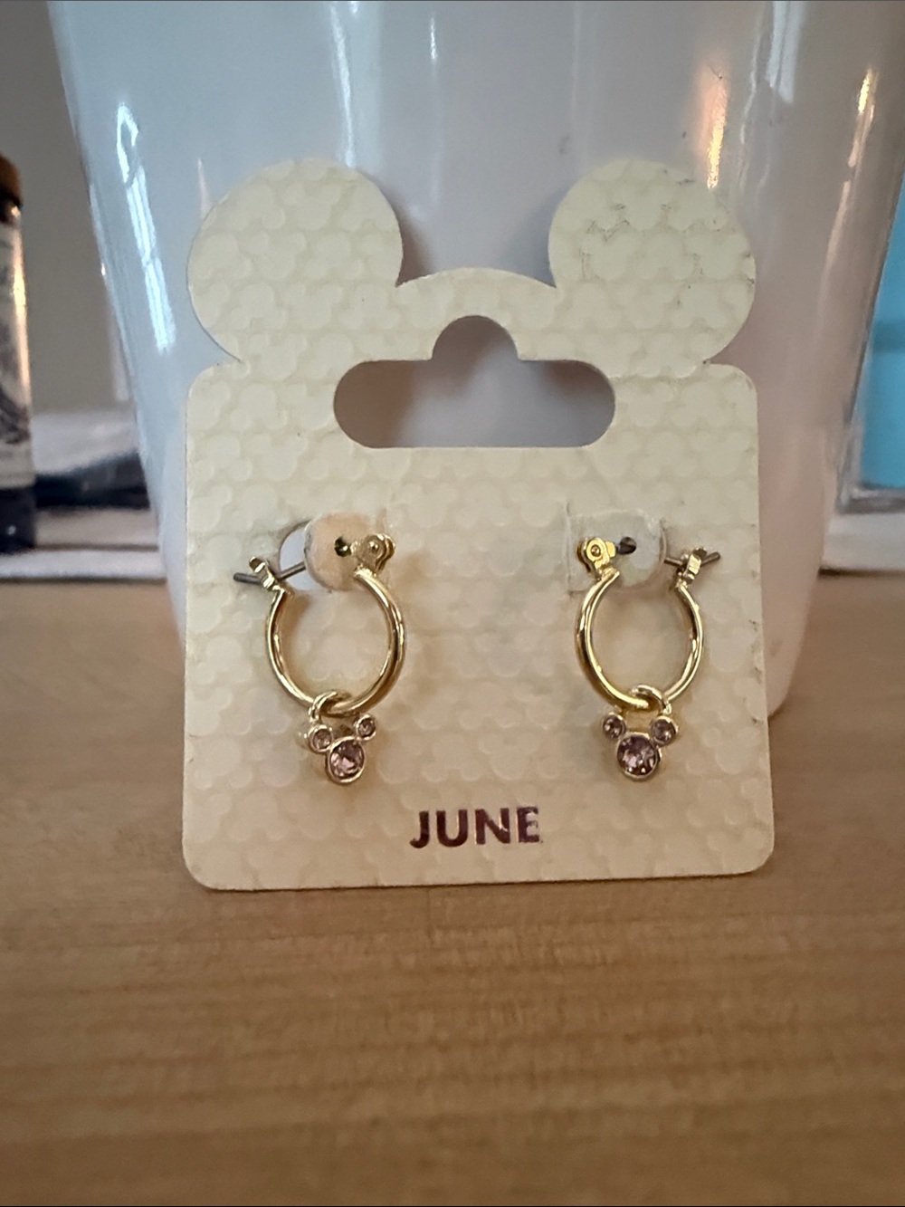 Gold Hoop Disney Parks Earrings with “June Birthstone” Pink Crystal Charm